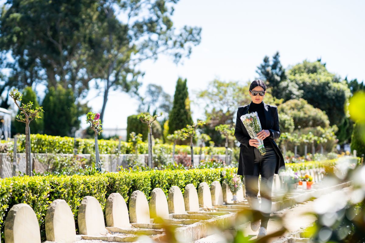 Lady walking through Castlebrook Memorial Park